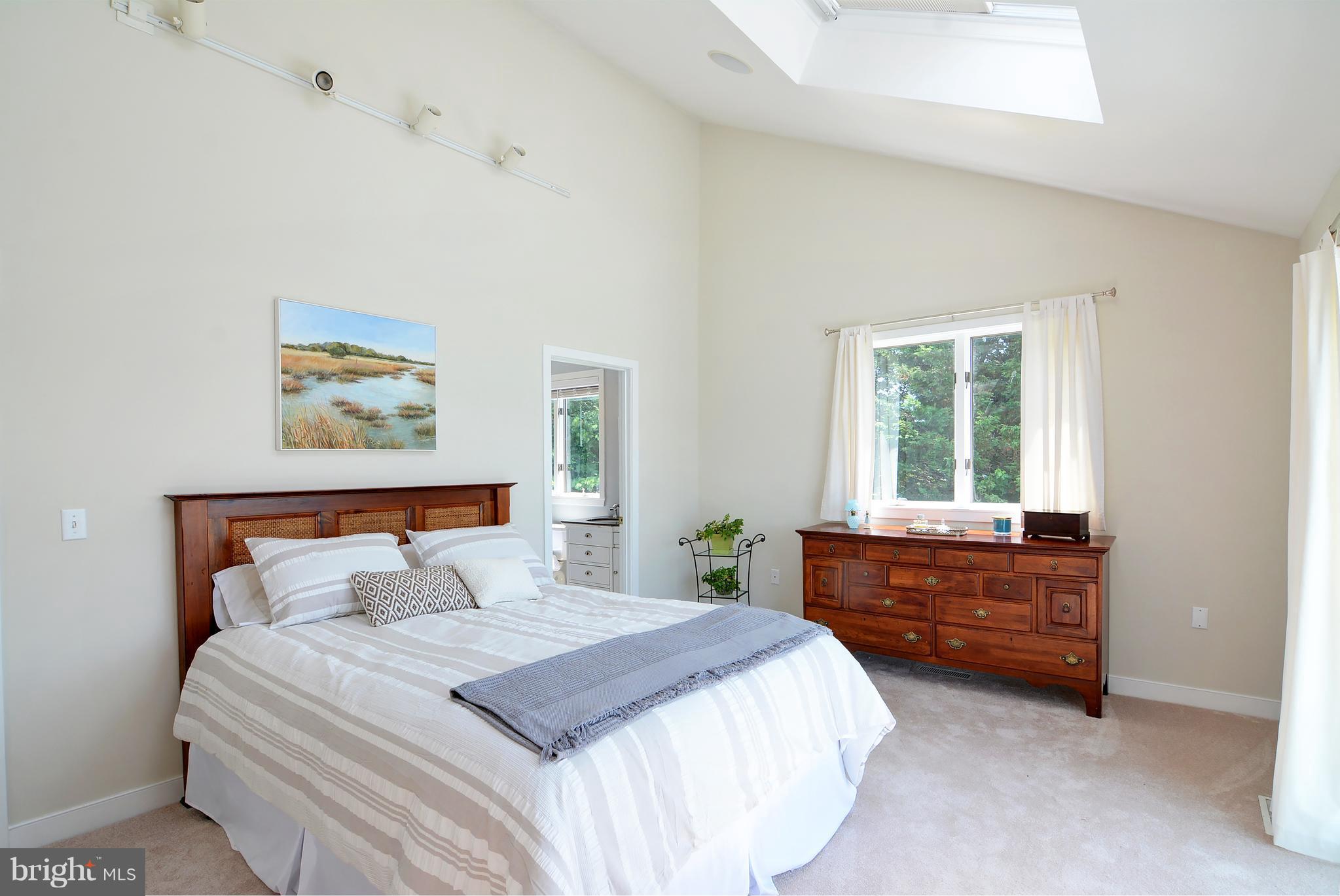 401 Old Point Road Chester, MD 21619 - Photo 16 of 28 a bedroom with a bed and window