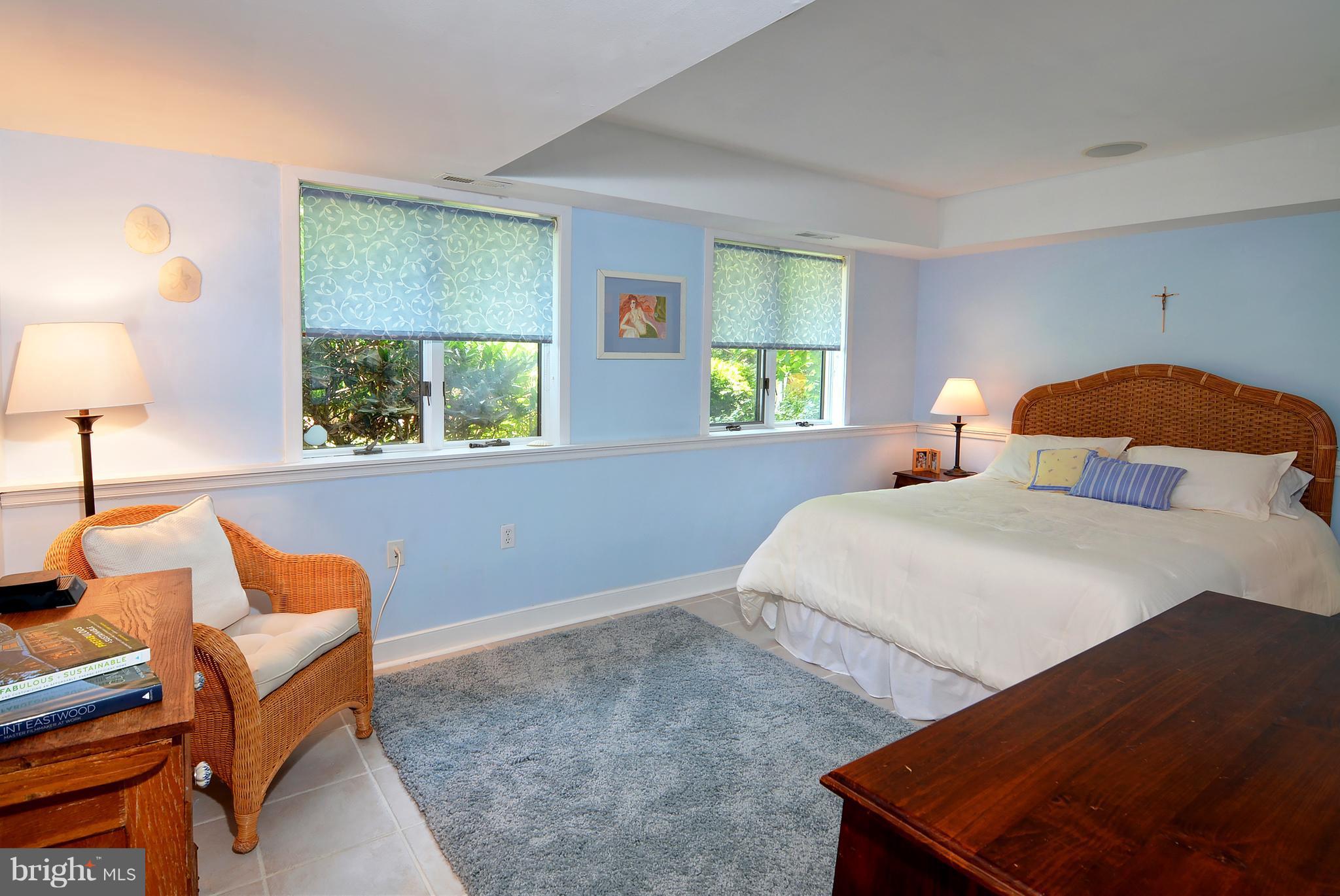 401 Old Point Road Chester, MD 21619 - Photo 25 of 28 a bedroom with bed and window