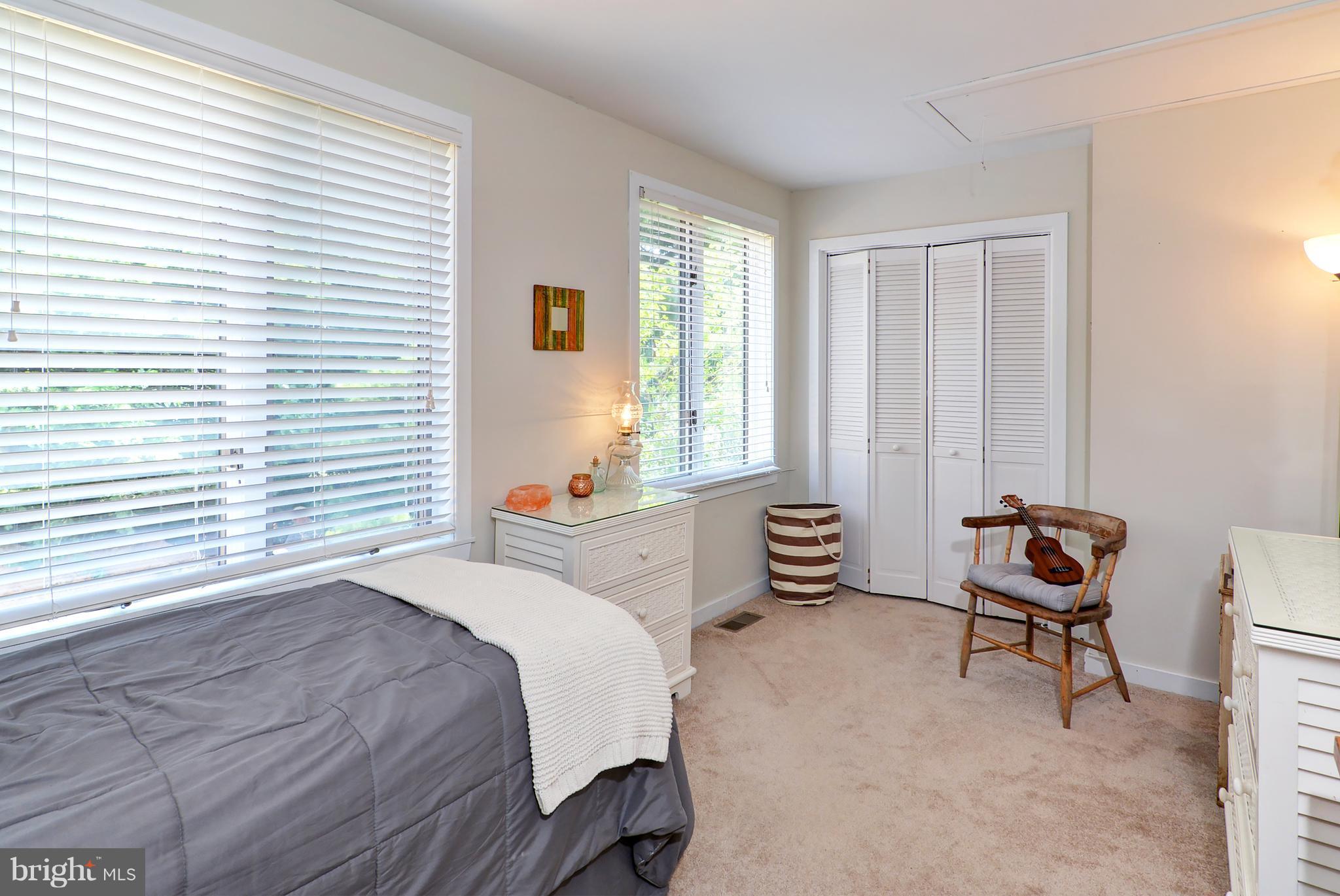 401 Old Point Road Chester, MD 21619 - Photo 27 of 28 a bedroom with a bed and a window