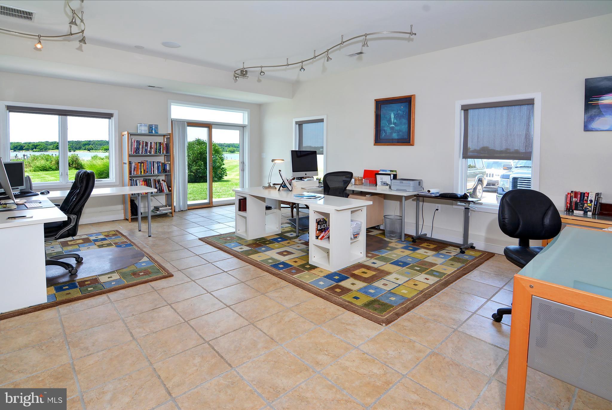 401 Old Point Road Chester, MD 21619 - Photo 28 of 28 a work room with furniture and a large window