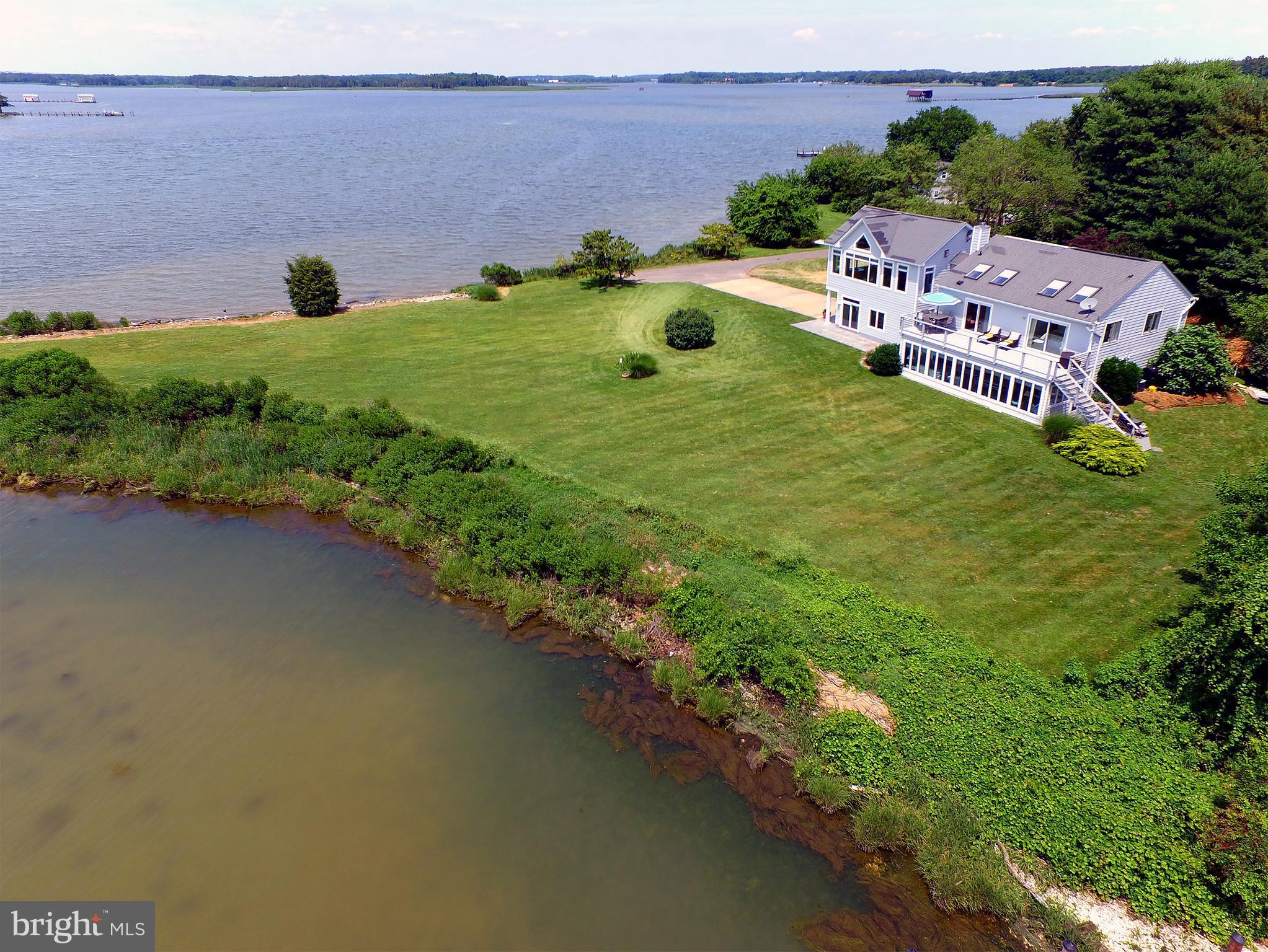 401 Old Point Road Chester, MD 21619 - Photo 4 of 28 an aerial view of a house with garden space and street view