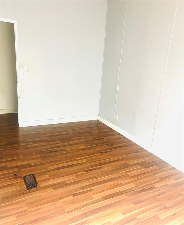 1100 Pecan Ridge Drive Venus, TX 76084 - Photo 9 of 13 Spare room with wood finished floors and baseboards