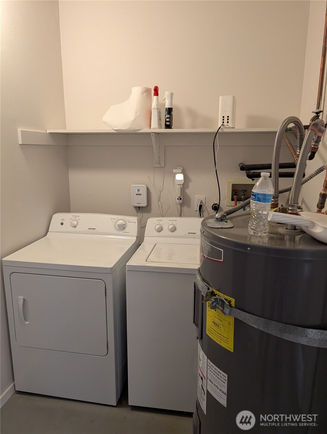 10341 Stone Avenue North Seattle, WA 98133 - Photo 17 of 18 a utility room with dryer and washer