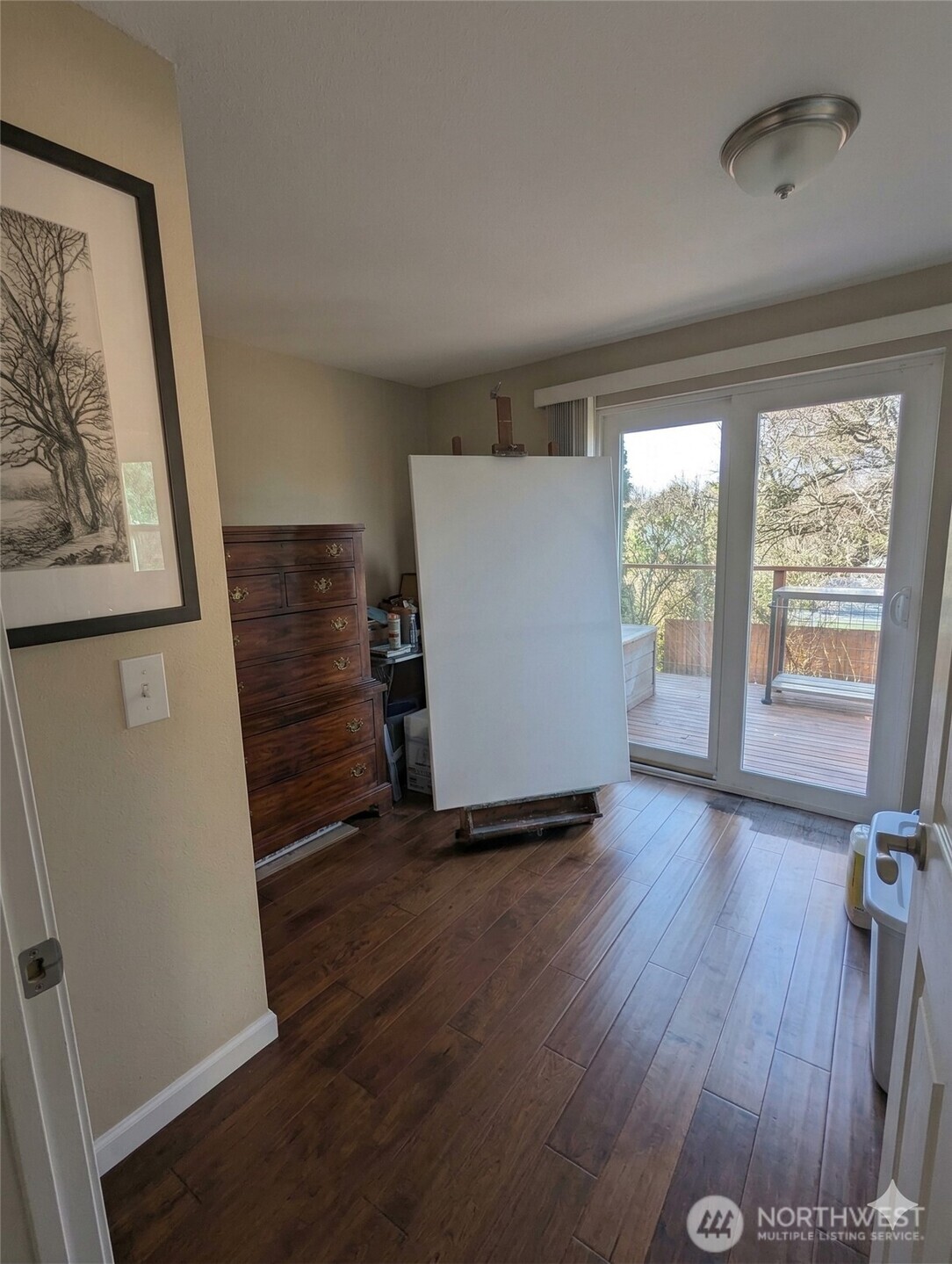 10341 Stone Avenue North Seattle, WA 98133 - Photo 6 of 18 wooden floor in an empty room with a window