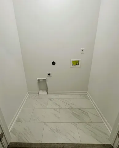 a bathroom with a granite countertop sink a toilet a mirror and shower