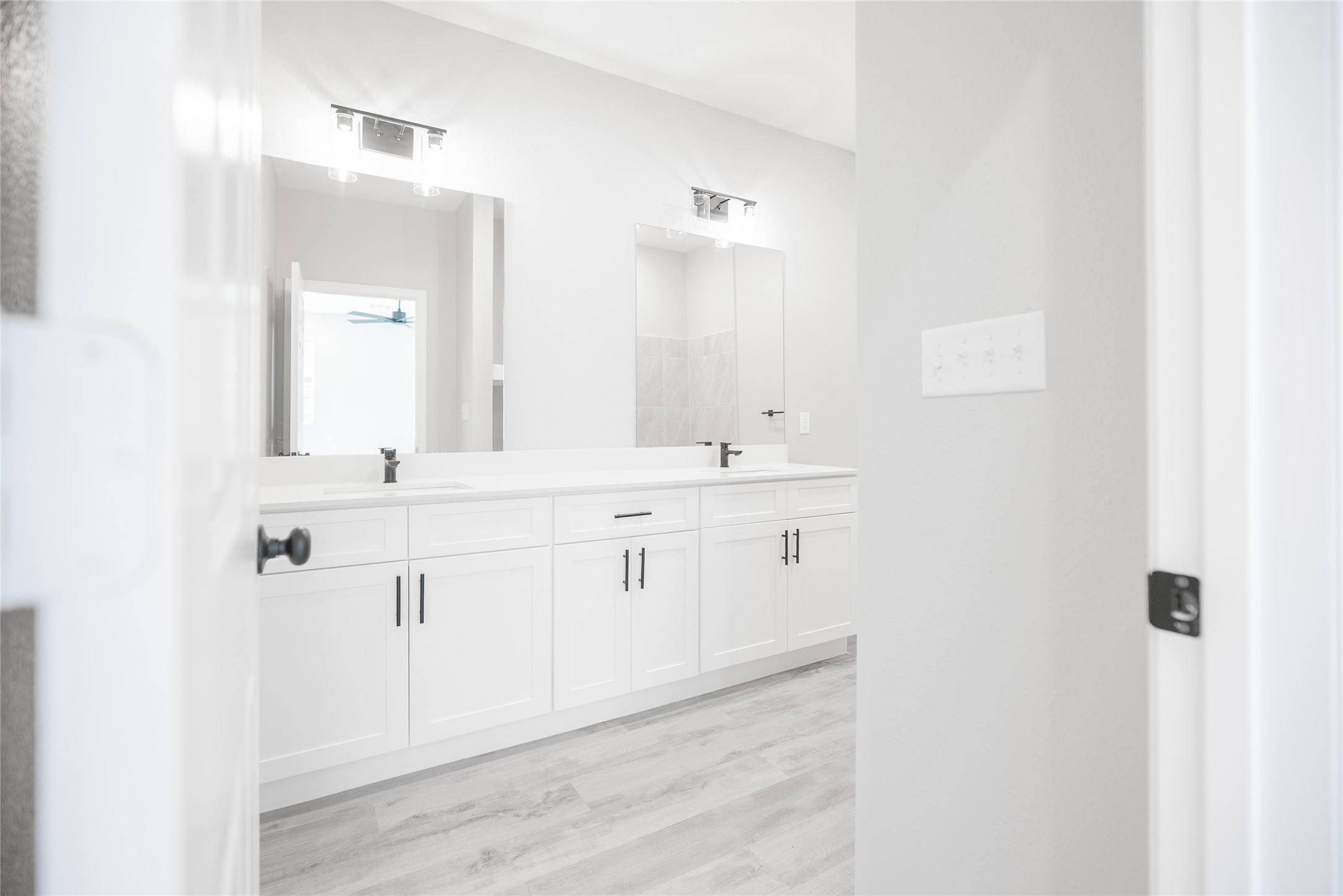 2101 Reinke Road, Unit 8301 Waller, TX 77484 - Photo 19 of 33 a bathroom with a sink and a mirror