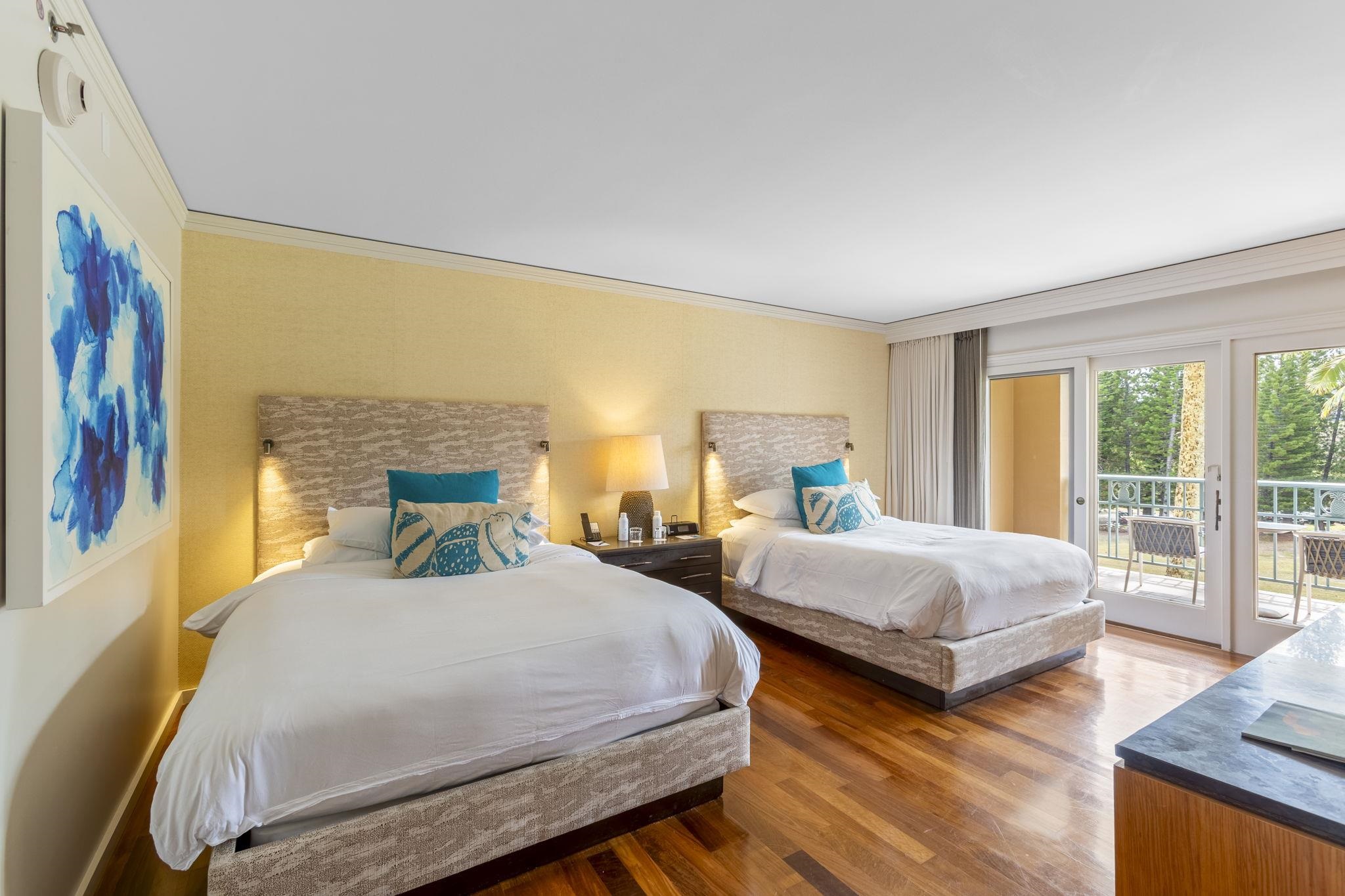 1 Ritz Carlton Drive, Unit 122123 Lahaina, HI 96761 - Photo 23 of 50 a bedroom with two beds and a large window