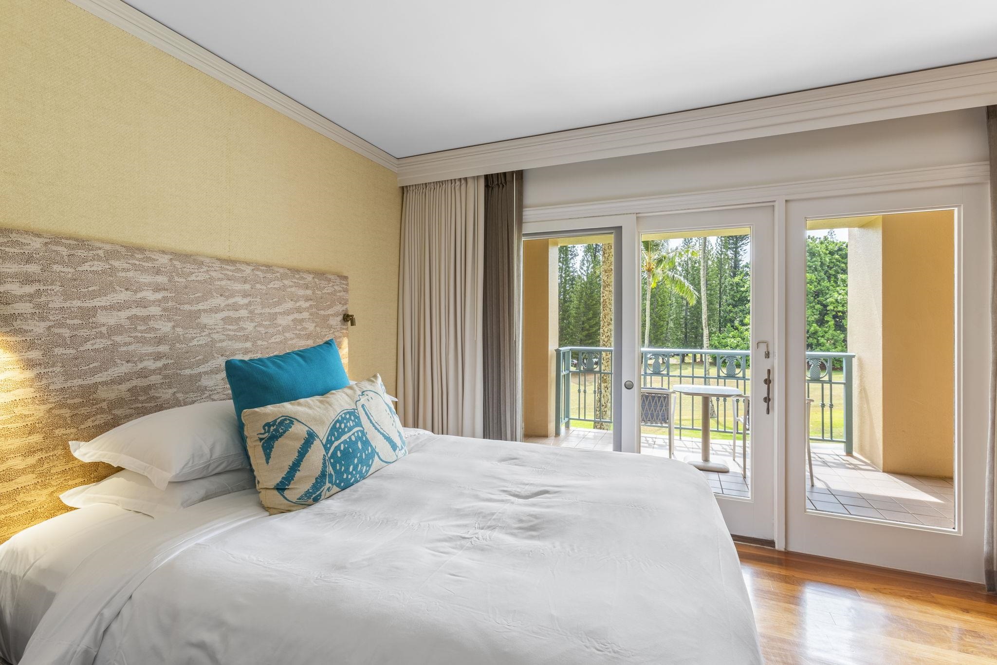 1 Ritz Carlton Drive, Unit 122123 Lahaina, HI 96761 - Photo 25 of 50 a bed sitting in a bedroom next to a window