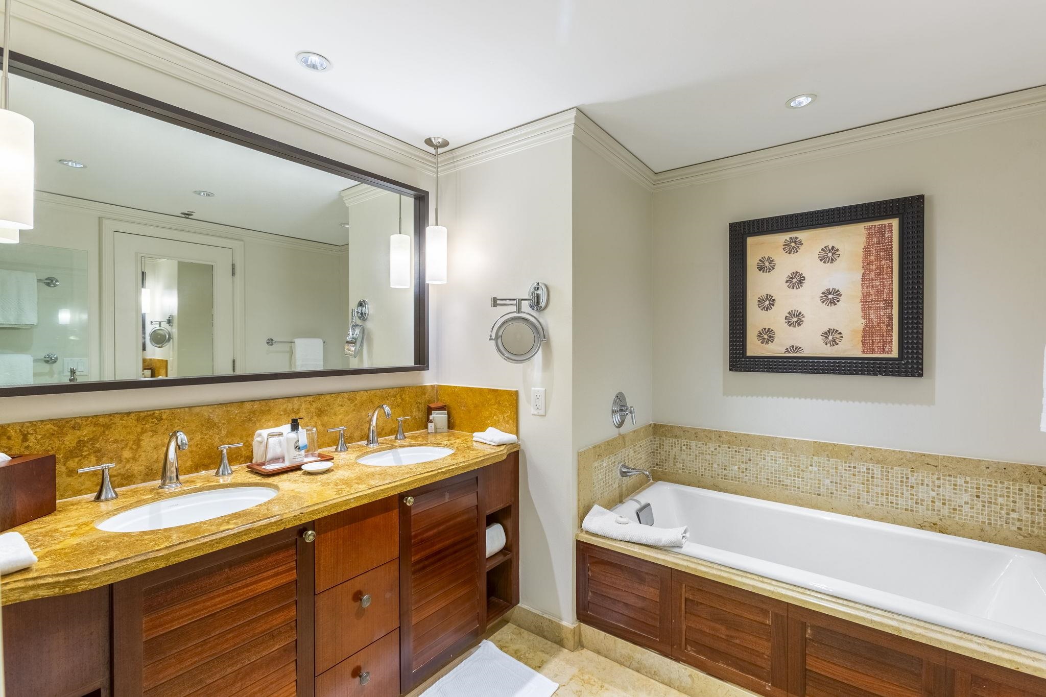 1 Ritz Carlton Drive, Unit 122123 Lahaina, HI 96761 - Photo 29 of 50 a bathroom with a tub a sink and mirror