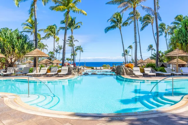 a view of swimming pool with outdoor seating