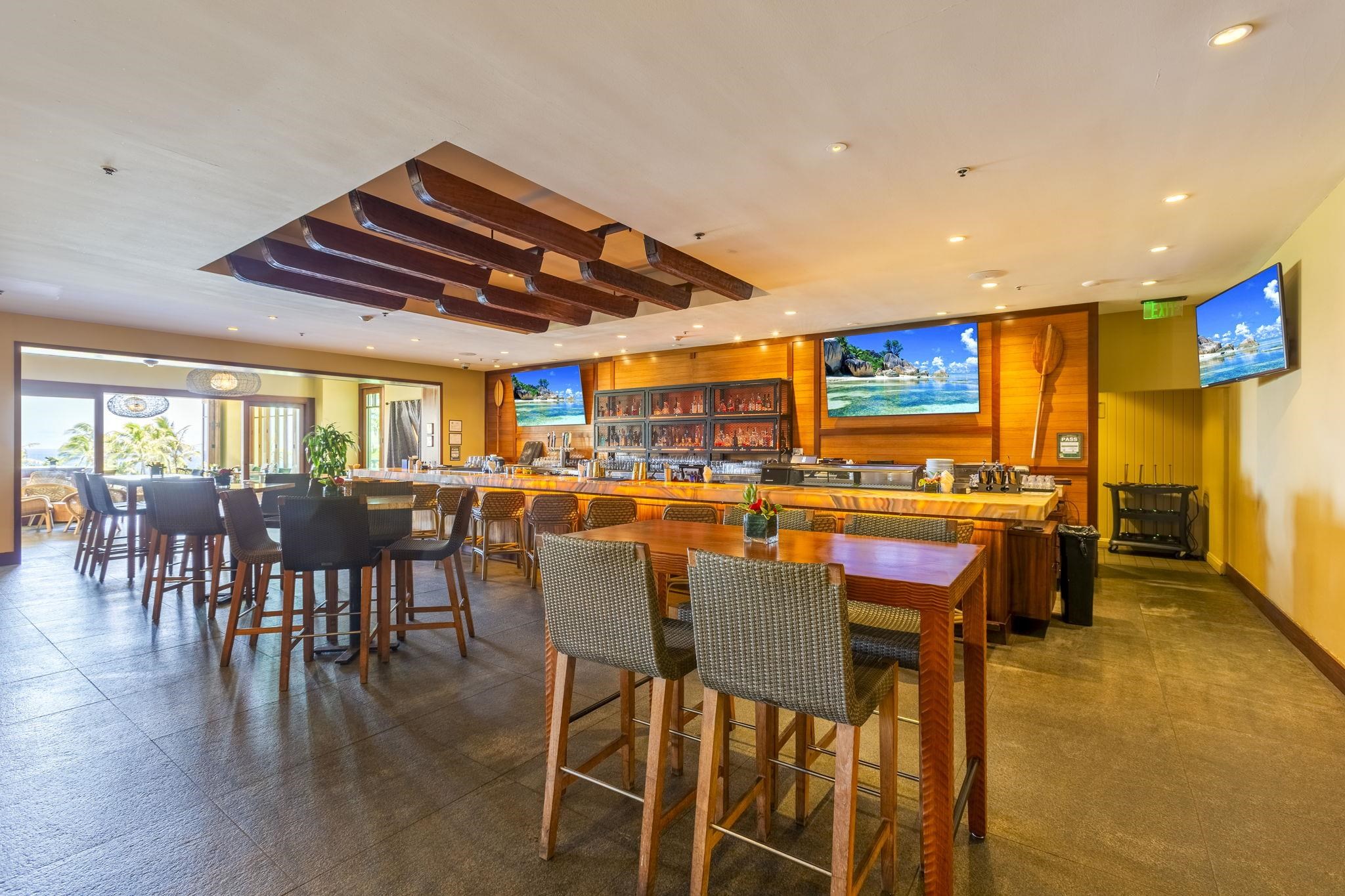 1 Ritz Carlton Drive, Unit 122123 Lahaina, HI 96761 - Photo 37 of 50 a dining room with furniture and wooden floor