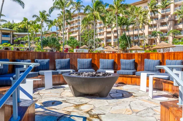 a view of a chairs and table in a patio