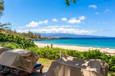 an aerial view of a residential apartment building with swimming pool