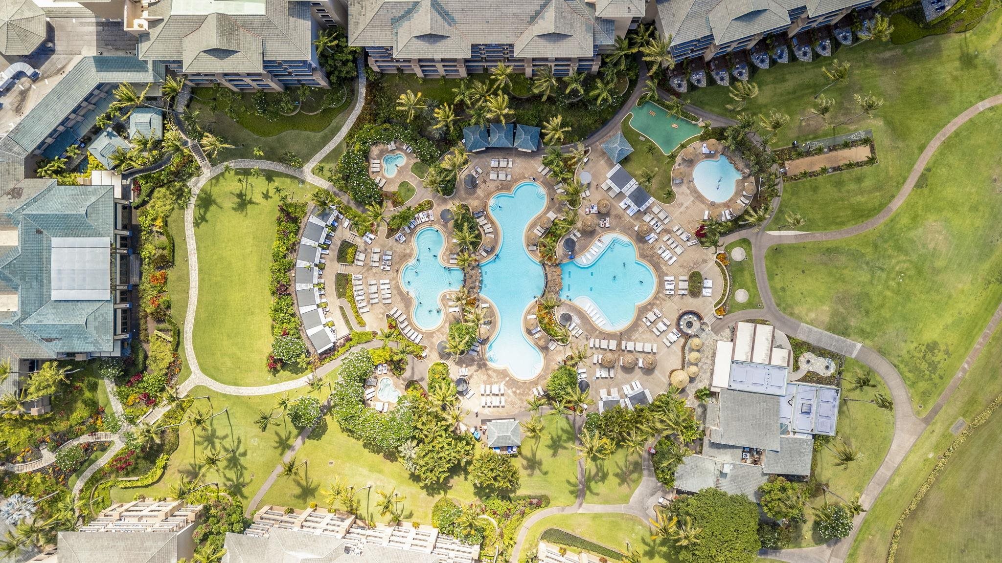 1 Ritz Carlton Drive, Unit 122123 Lahaina, HI 96761 - Photo 43 of 50 an aerial view of a residential apartment building with swimming pool