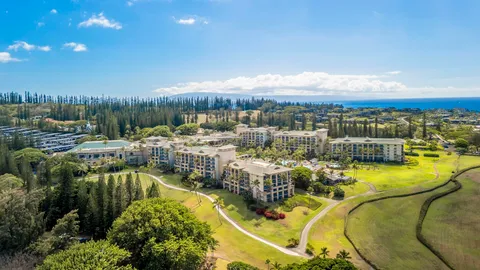a view of a lake with a house