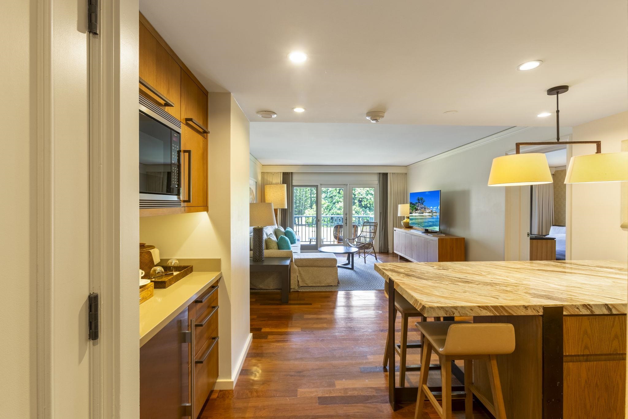 1 Ritz Carlton Drive, Unit 122123 Lahaina, HI 96761 - Photo 10 of 50 a view of a dining room with furniture window and wooden floor