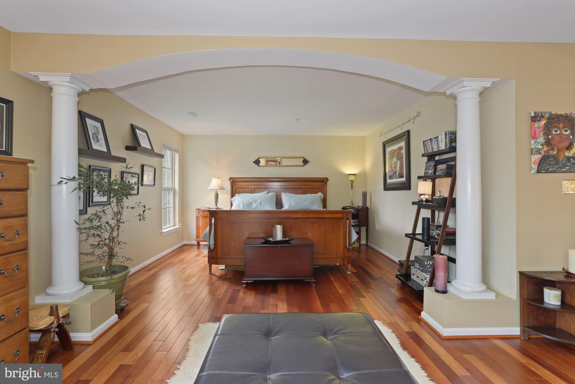 9411 Merkel Road Bowie, MD 20715 - Photo 17 of 42 Dramatic Master's Suite with Columns & Hardwoods