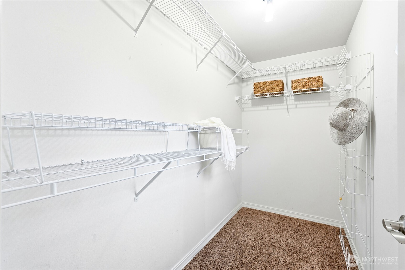 18219 58th St Court East Lake Tapps, WA 98391 - Photo 22 of 40 a view of storage and utility room with washer and dryer