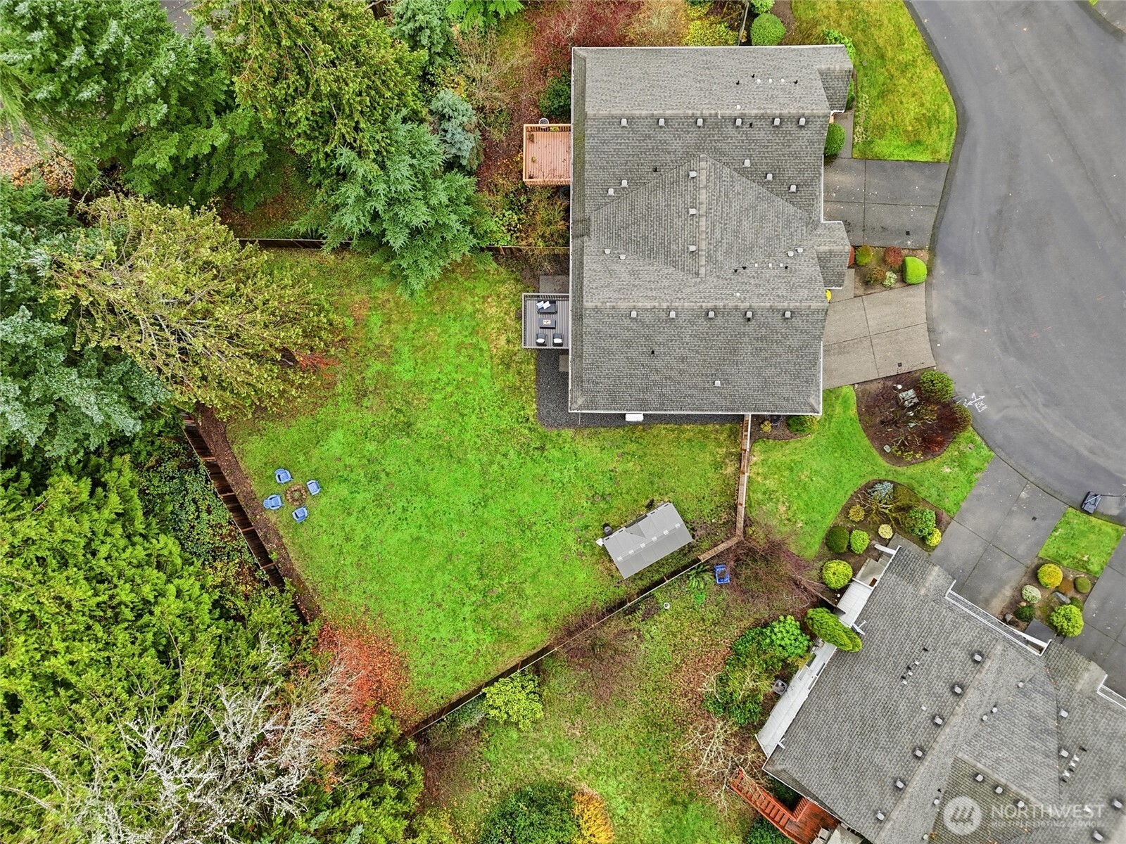 18219 58th St Court East Lake Tapps, WA 98391 - Photo 36 of 40 an aerial view of a house with a garden
