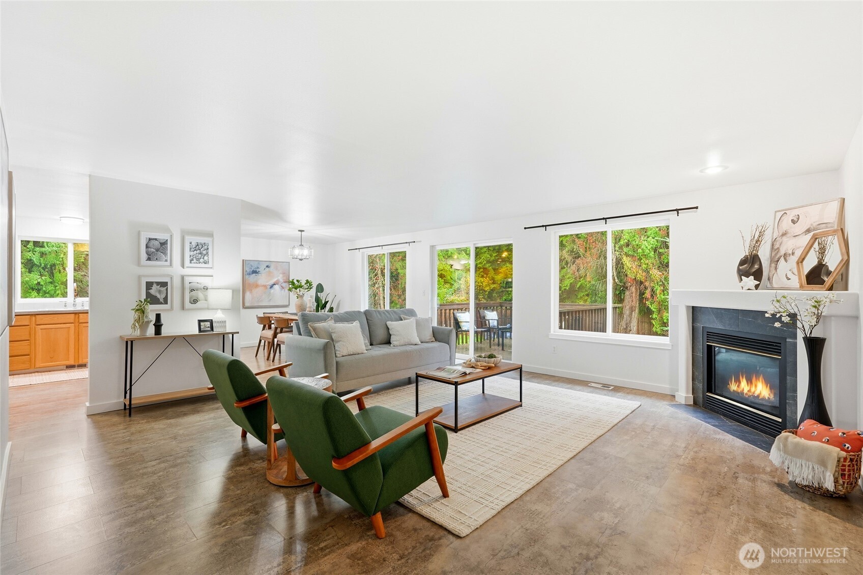 18219 58th St Court East Lake Tapps, WA 98391 - Photo 6 of 40 a living room with furniture and a fireplace
