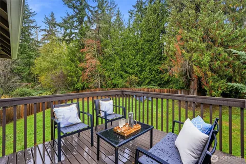 a view of a two chairs in the deck