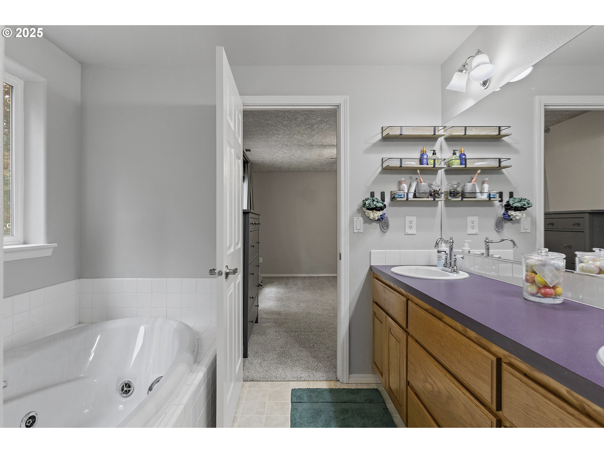 7771 St Charles Street Northeast Keizer, OR 97303 - Photo 27 of 42 a bathroom with a sink and mirror