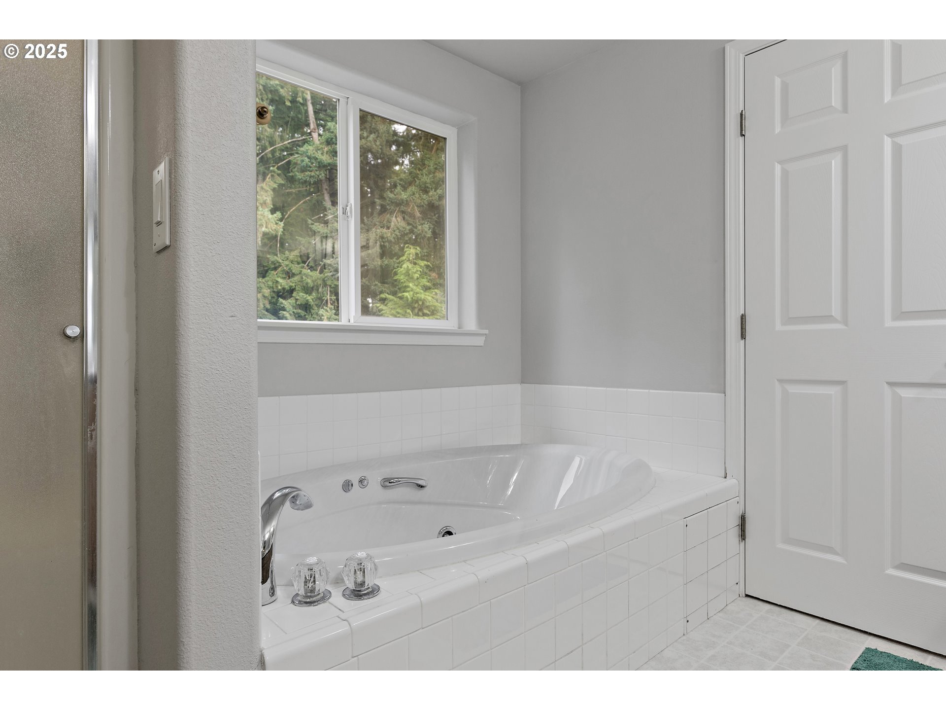 7771 St Charles Street Northeast Keizer, OR 97303 - Photo 28 of 42 a bathroom with a tub and shower