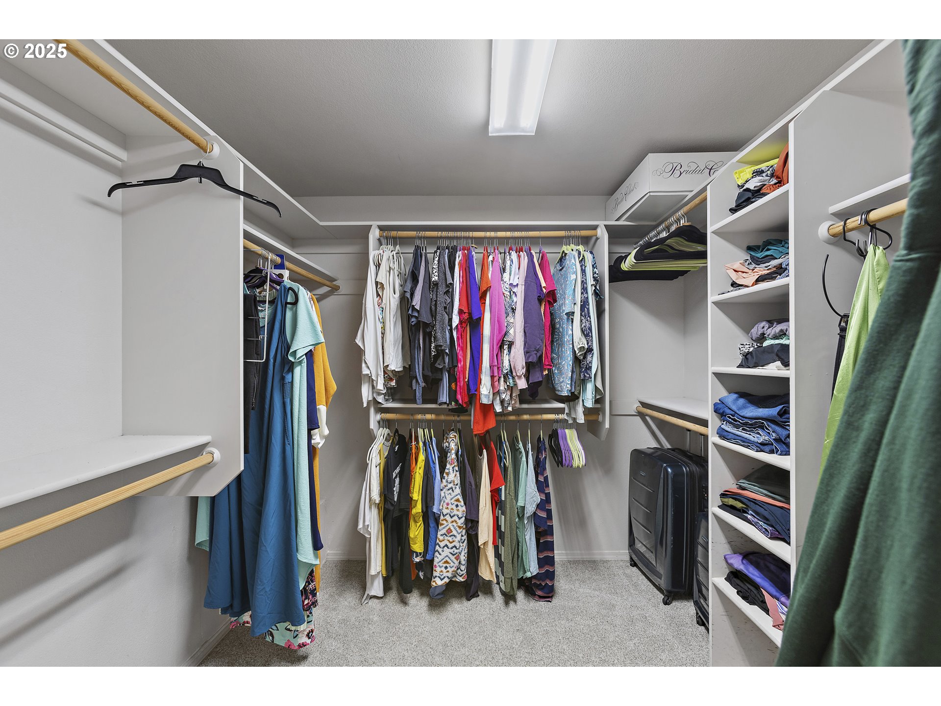 7771 St Charles Street Northeast Keizer, OR 97303 - Photo 29 of 42 a view of walk in closet with clothes