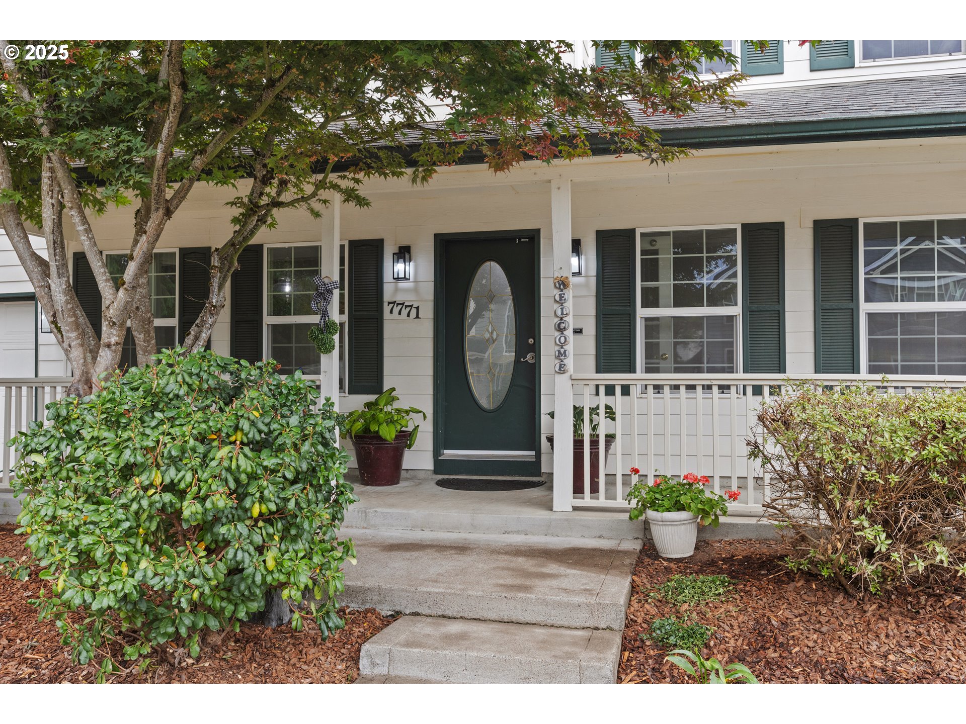 7771 St Charles Street Northeast Keizer, OR 97303 - Photo 3 of 42 a front view of a house with garden