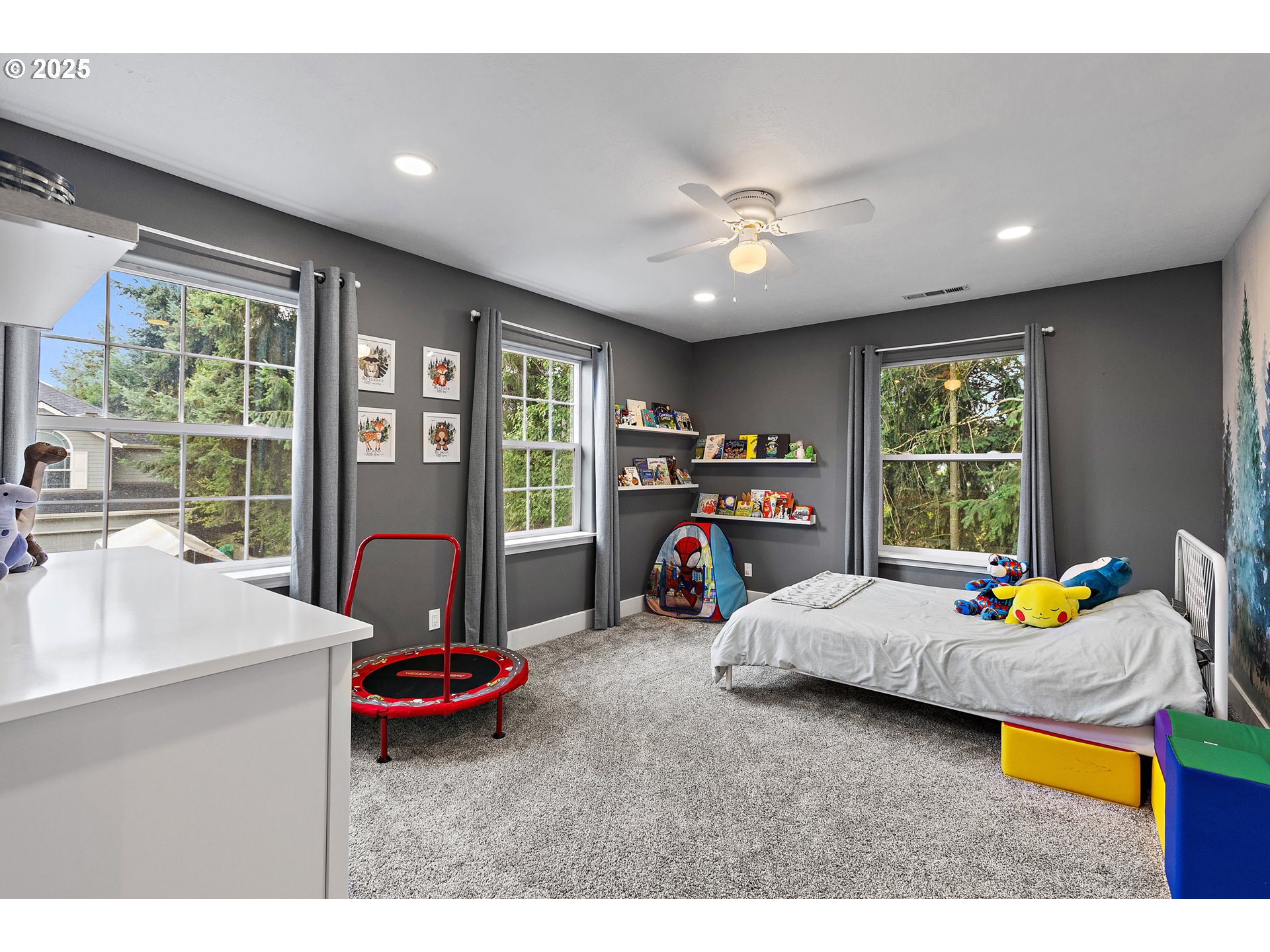 7771 St Charles Street Northeast Keizer, OR 97303 - Photo 32 of 42 a bedroom with furniture and a large window