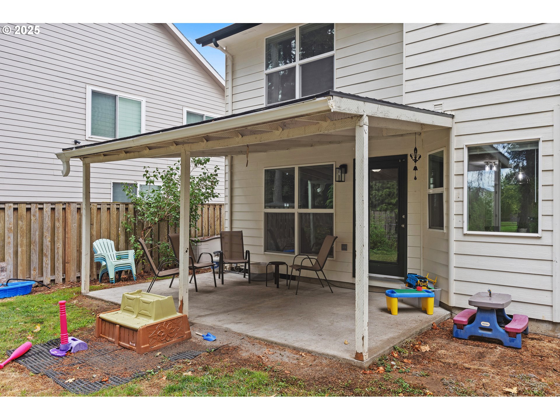 7771 St Charles Street Northeast Keizer, OR 97303 - Photo 37 of 42 a view of a patio with table and chairs and potted plants