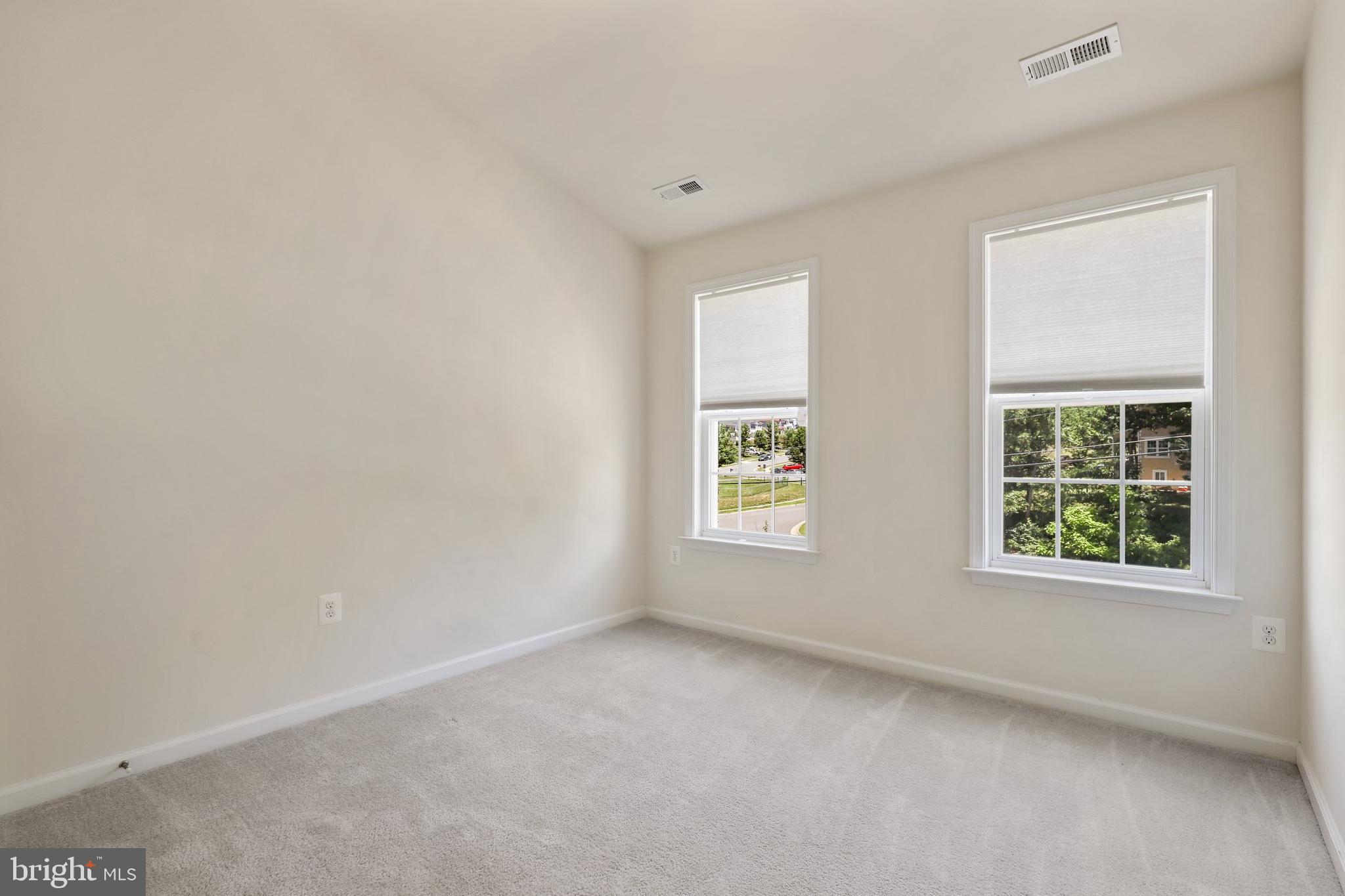 17666 Possum Point Road Dumfries, VA 22026 - Photo 14 of 40 an empty room with a window