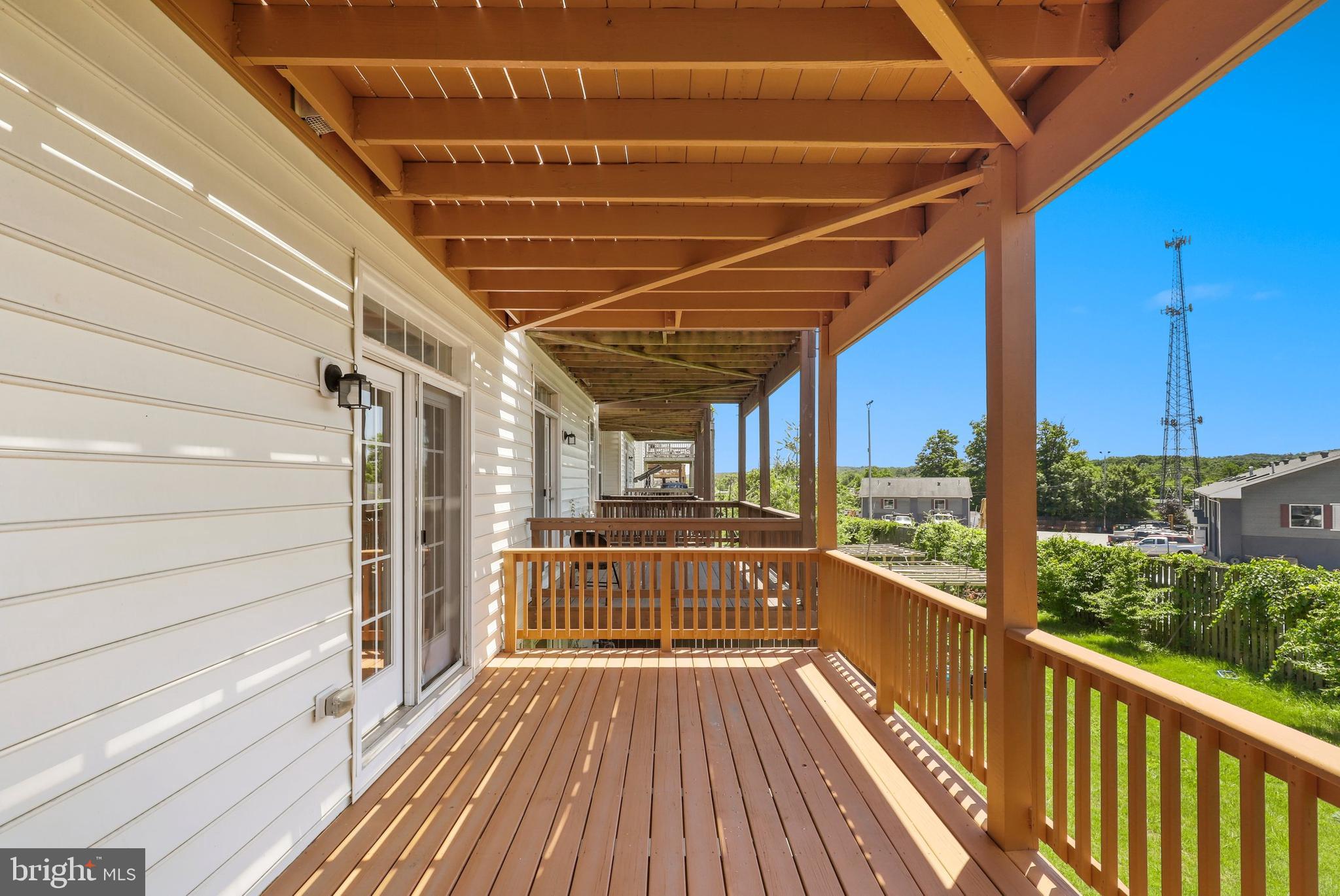 17666 Possum Point Road Dumfries, VA 22026 - Photo 37 of 40 a view of a balcony with wooden floor