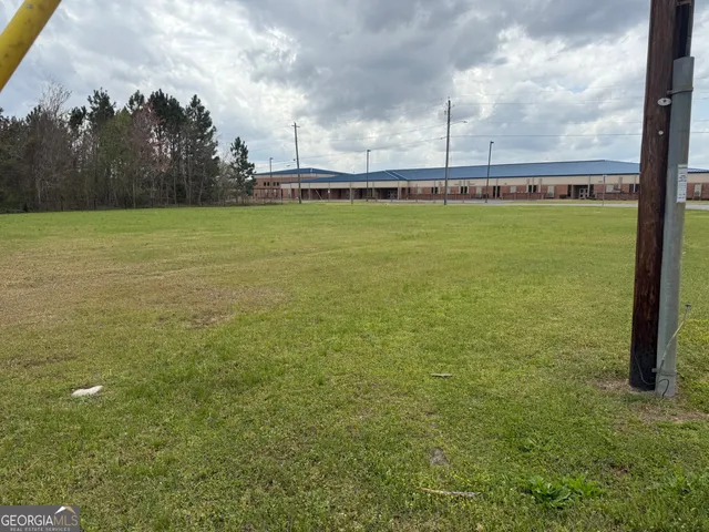 a view of a swimming pool and outdoor space