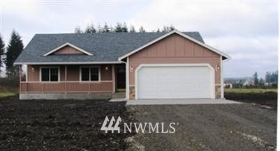 18009 Danby Drive Southwest Rochester, WA 98579 - Photo 1 of 1 a front view of a house with a yard
