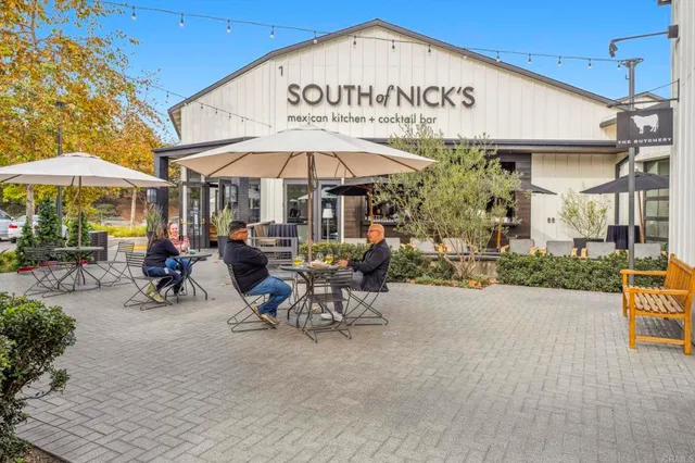 a view of a house with a park