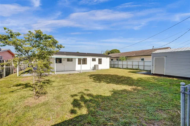 a view of a house with a big yard
