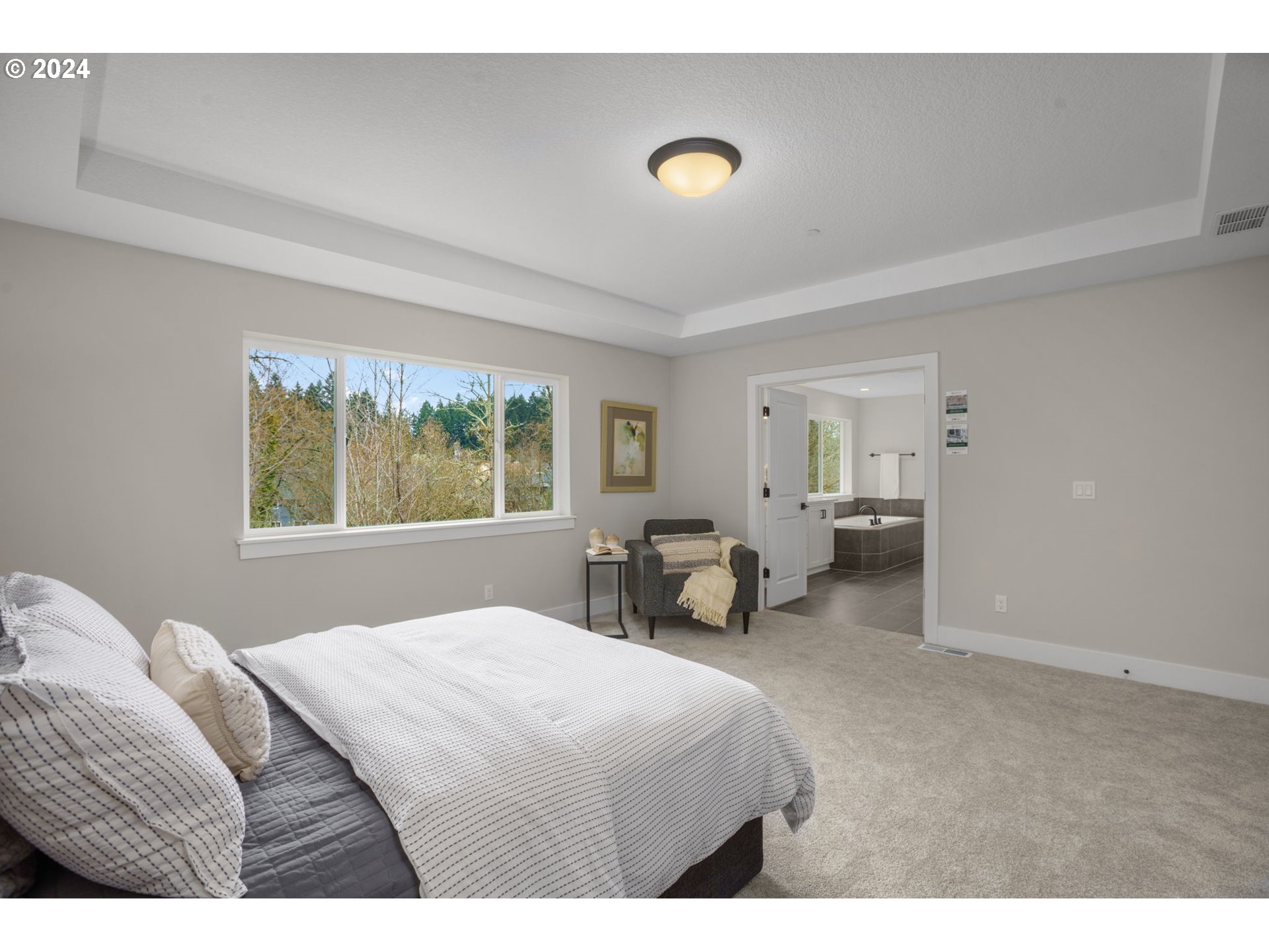7209 Northeast Ridge Drive, Unit LOT 1 Hillsboro, OR 97124 - Photo 12 of 25 a bedroom with a bed and window