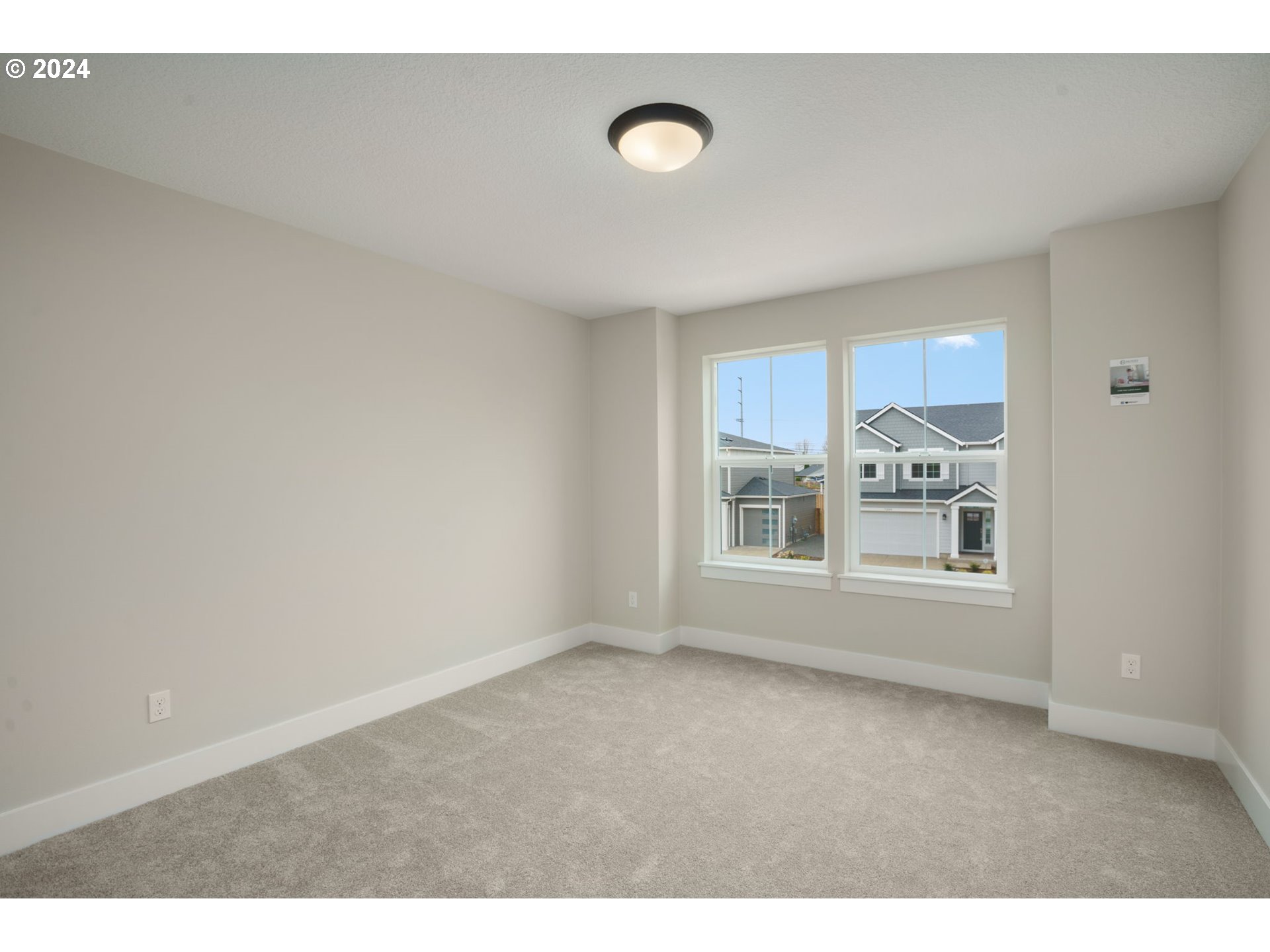 7209 Northeast Ridge Drive, Unit LOT 1 Hillsboro, OR 97124 - Photo 19 of 25 a view of an empty room with a window