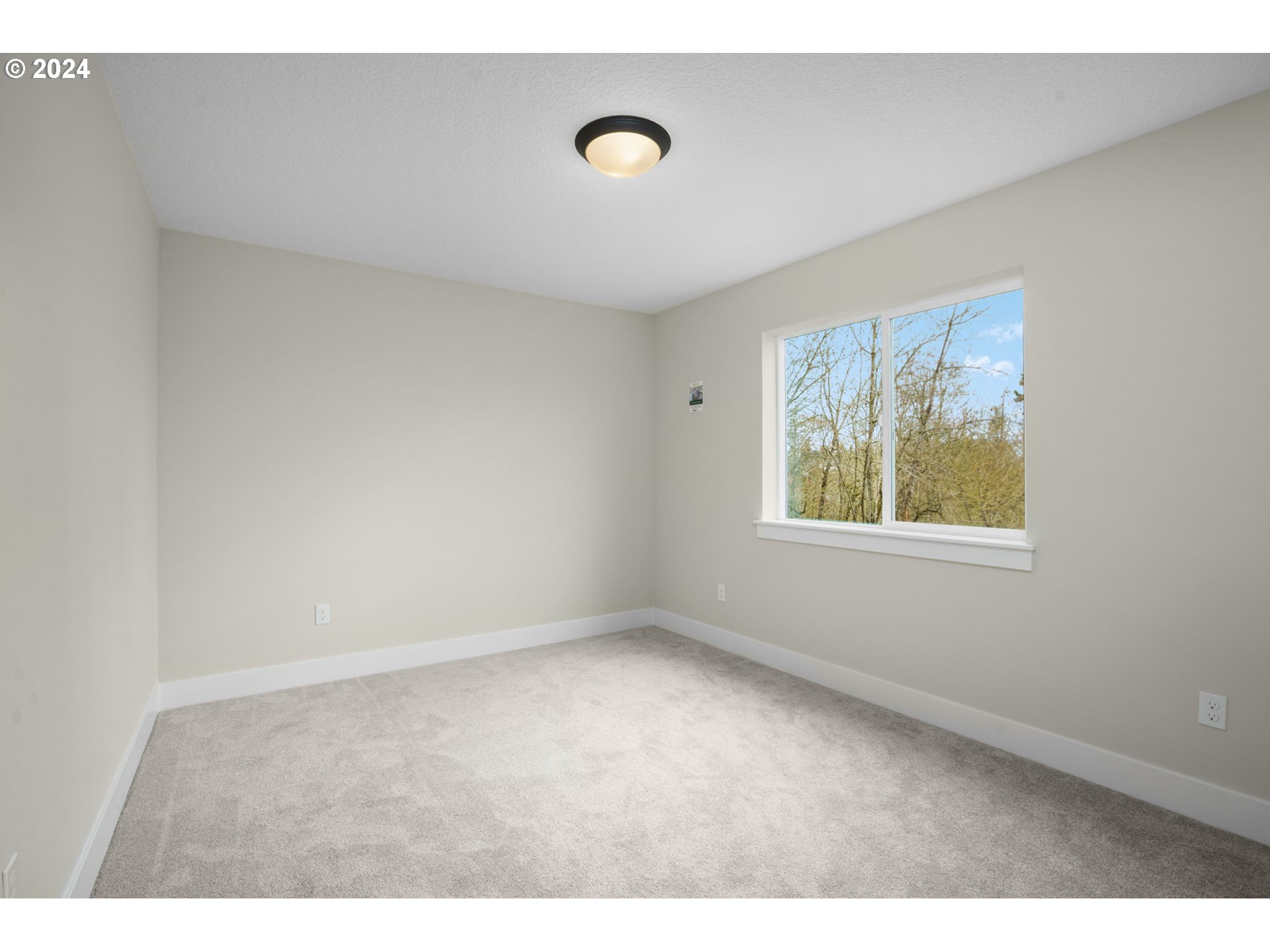 7209 Northeast Ridge Drive, Unit LOT 1 Hillsboro, OR 97124 - Photo 20 of 25 a view of room with hardwood floor and window