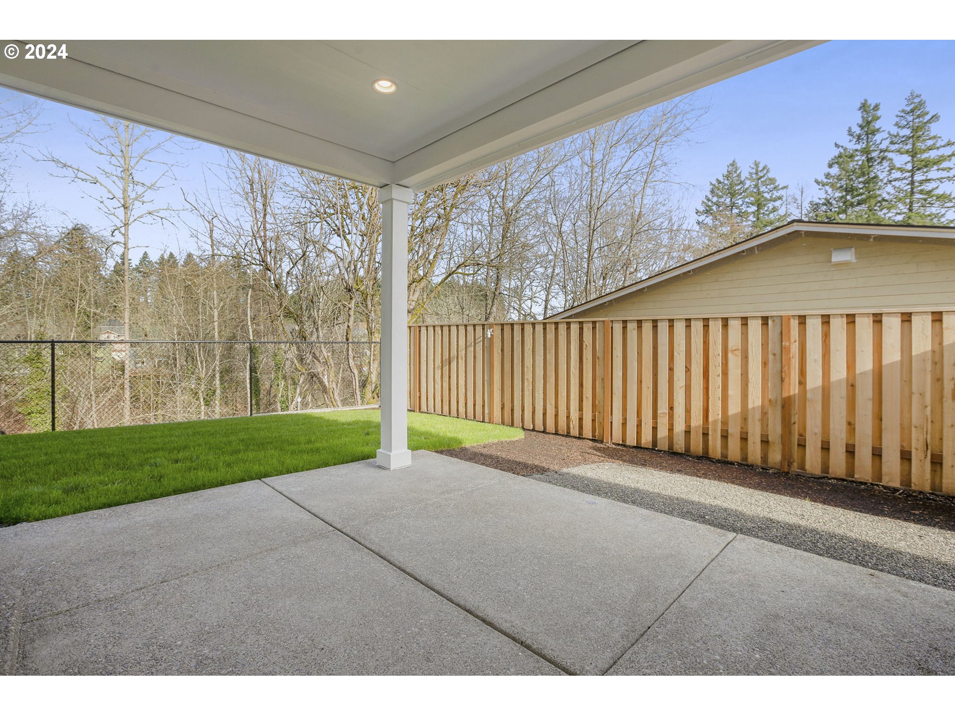 7209 Northeast Ridge Drive, Unit LOT 1 Hillsboro, OR 97124 - Photo 25 of 25 a view of a porch with a yard