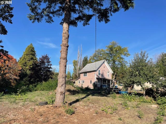 541 Churchman Street Willamina, OR 97396 - Photo 5 of 6 a house view with a outdoor space