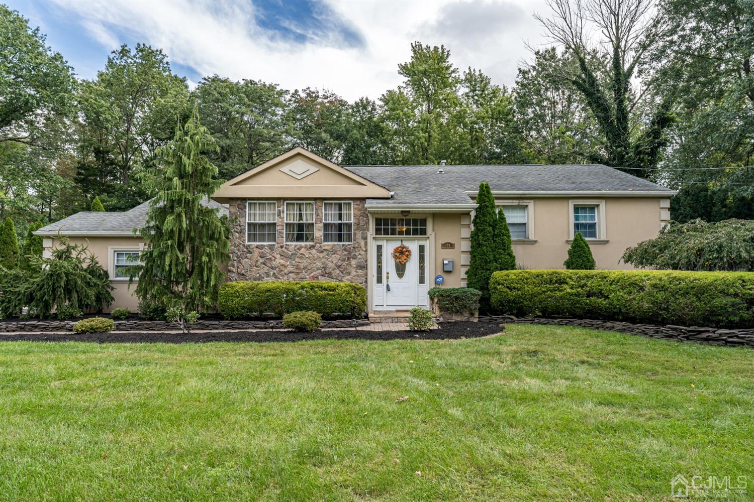 199 Stafford Road Colonia, NJ 07067 - Photo 1 of 44 a front view of a house with a yard