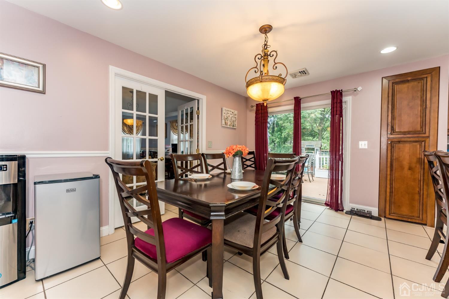 199 Stafford Road Colonia, NJ 07067 - Photo 7 of 44 a dining room with furniture and window