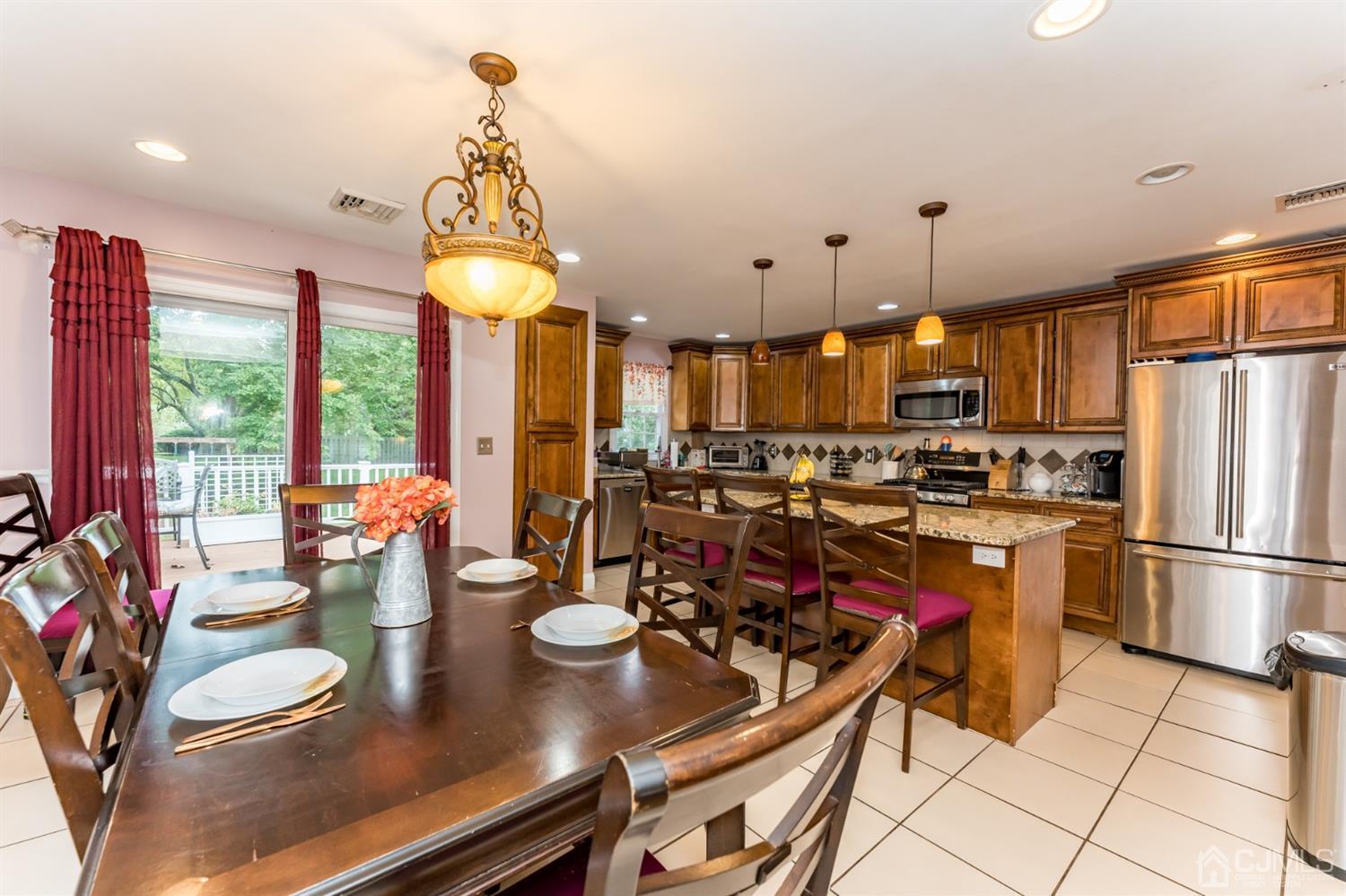 199 Stafford Road Colonia, NJ 07067 - Photo 9 of 44 a kitchen with a sink appliances and cabinets