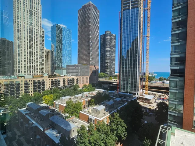 a view of an empty room with a balcony