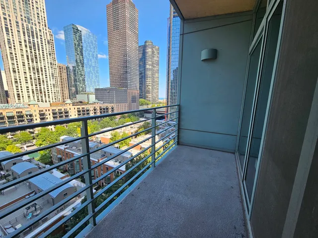 a view of city with tall buildings