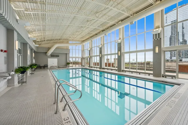 a backyard of a house with yard and outdoor seating