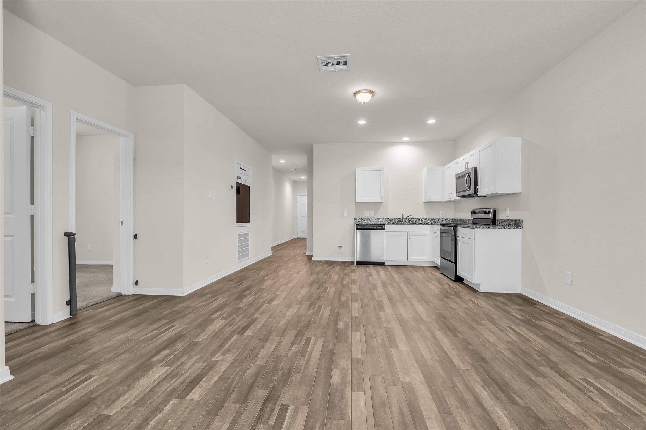 2511 17th Street Hempstead, TX 77445 - Photo 11 of 23 a view of kitchen with wooden floor
