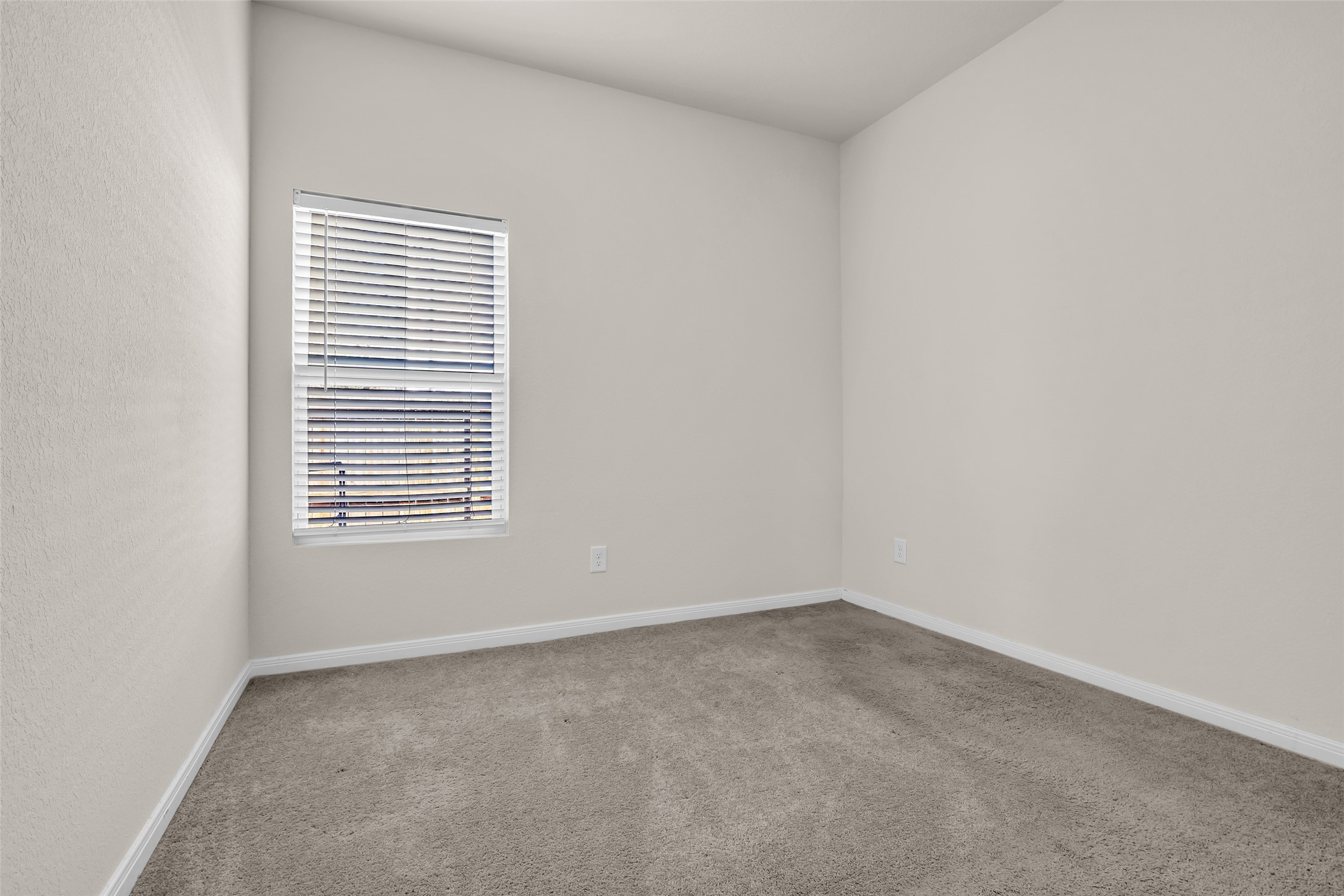 2511 17th Street Hempstead, TX 77445 - Photo 17 of 23 an empty room with a window